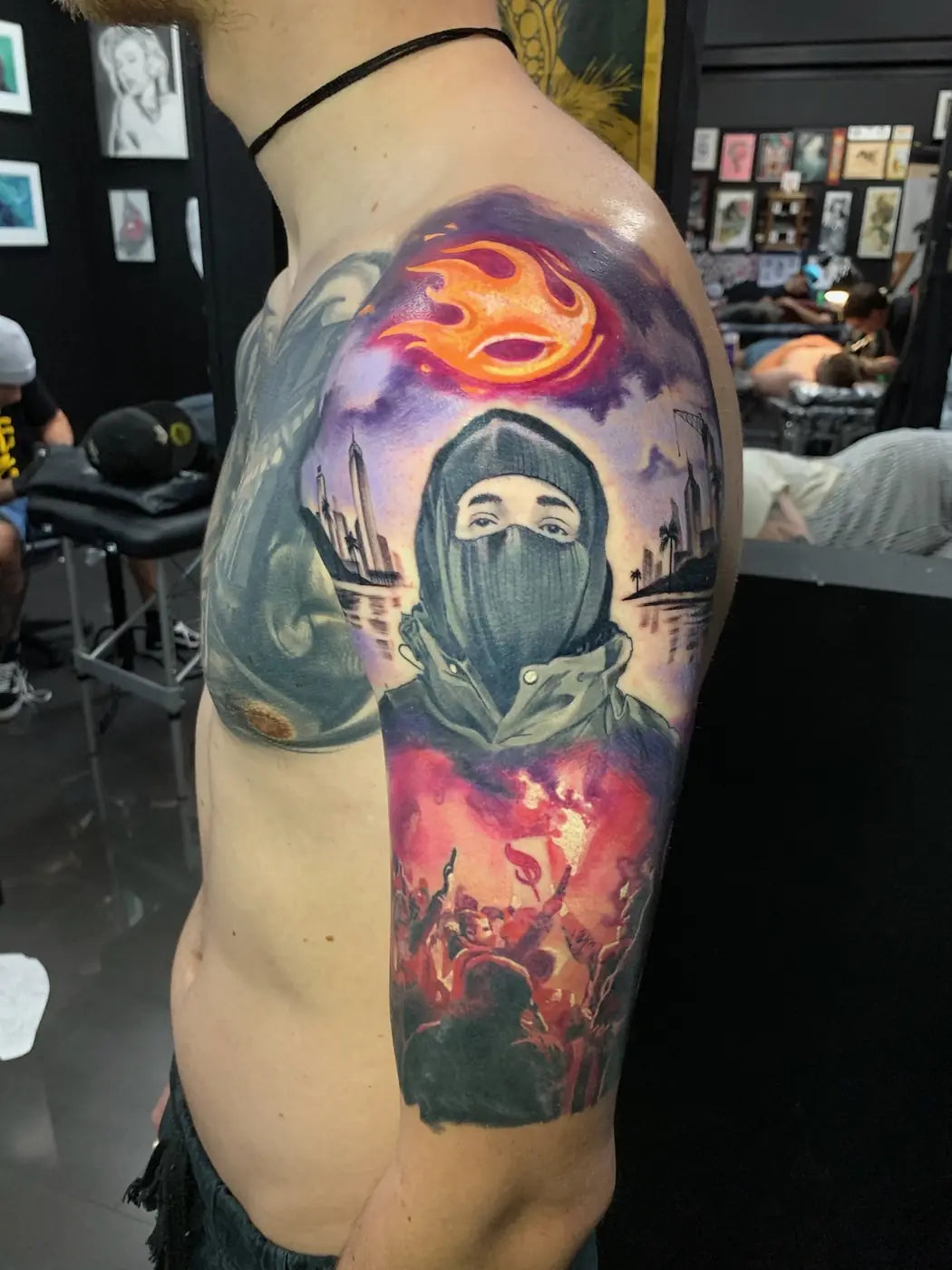 Masked figure shoulder